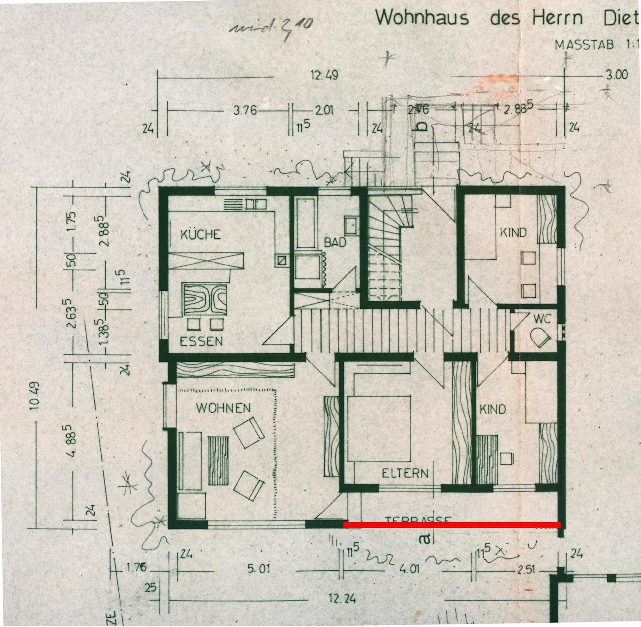 Floor plan of a house with kitchen, dining and living area, bathroom, master and children’s rooms, and terrace