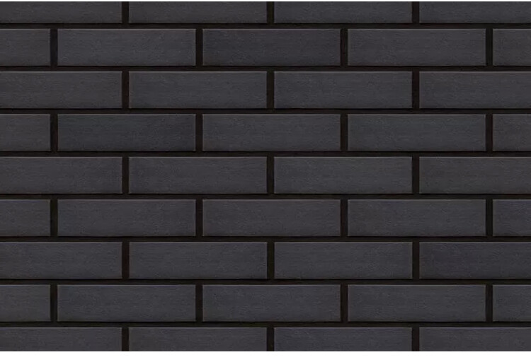 Dunkle Ziegelwand mit horizontal angeordneten dunkelgrauen Ziegeln.
