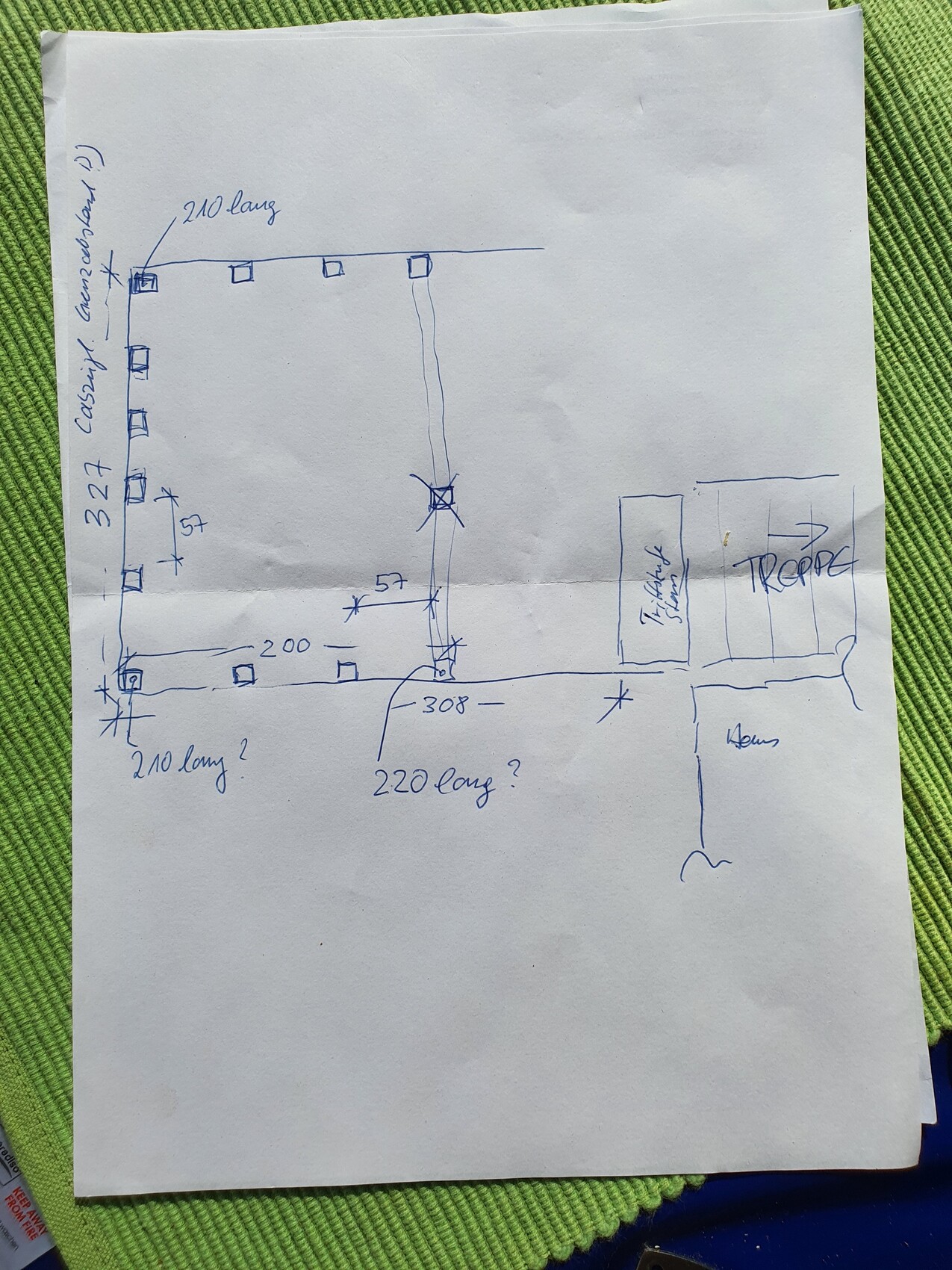 Hand-drawn floor plan sketch: rectangle with dimensions, border squares, right-side labeling