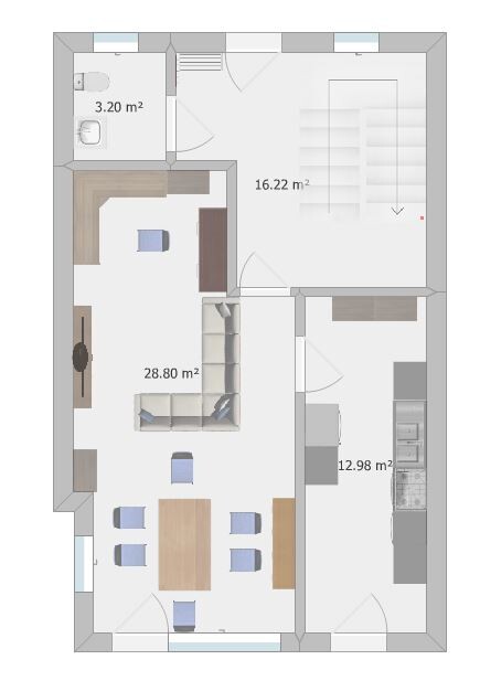 Floor plan of a residential house: living room, kitchen, bathroom and hallway with staircase.