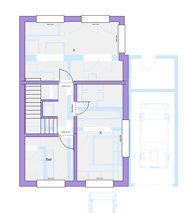 Floor plan of a residential house: stairwell, bathroom, two kitchens (K), hallways, and adjacent garage.