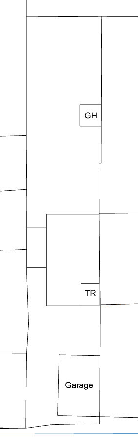 Black and white floor plan of a house with garage and entrance