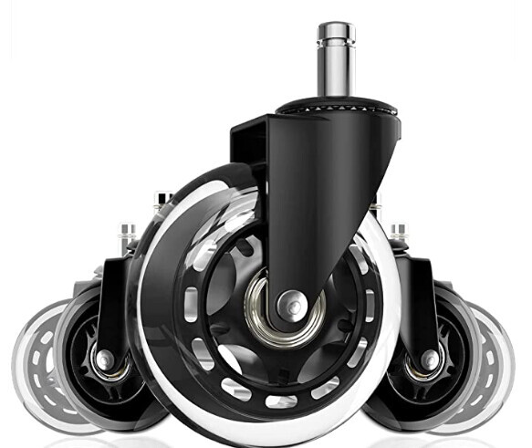 Close-up of a black caster system with large wheels and metal bracket