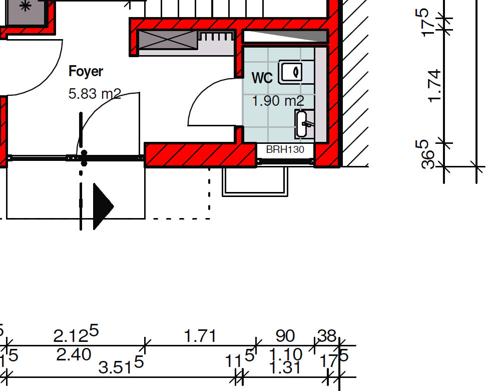 2D floor plan showing foyer and toilet area in an apartment layout