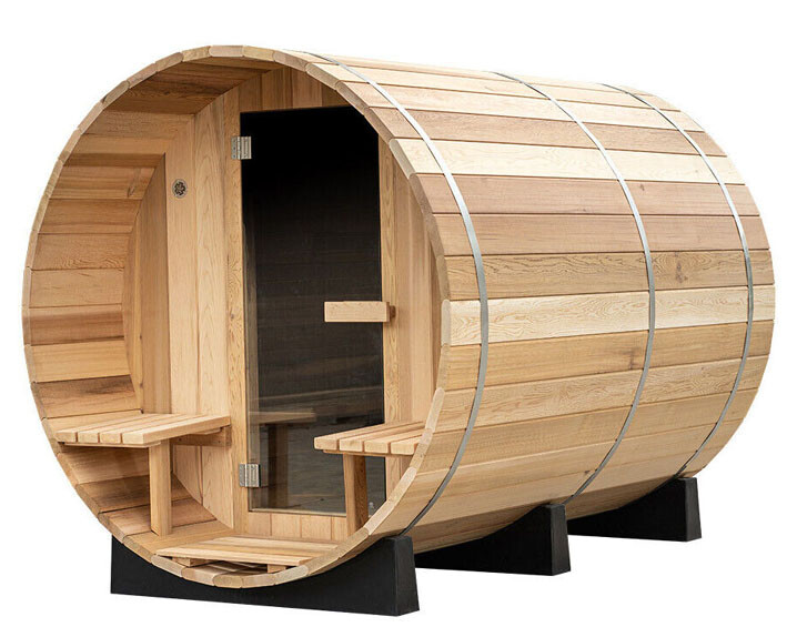 Barrel-shaped wooden sauna with glass door, interior benches, on black supports.