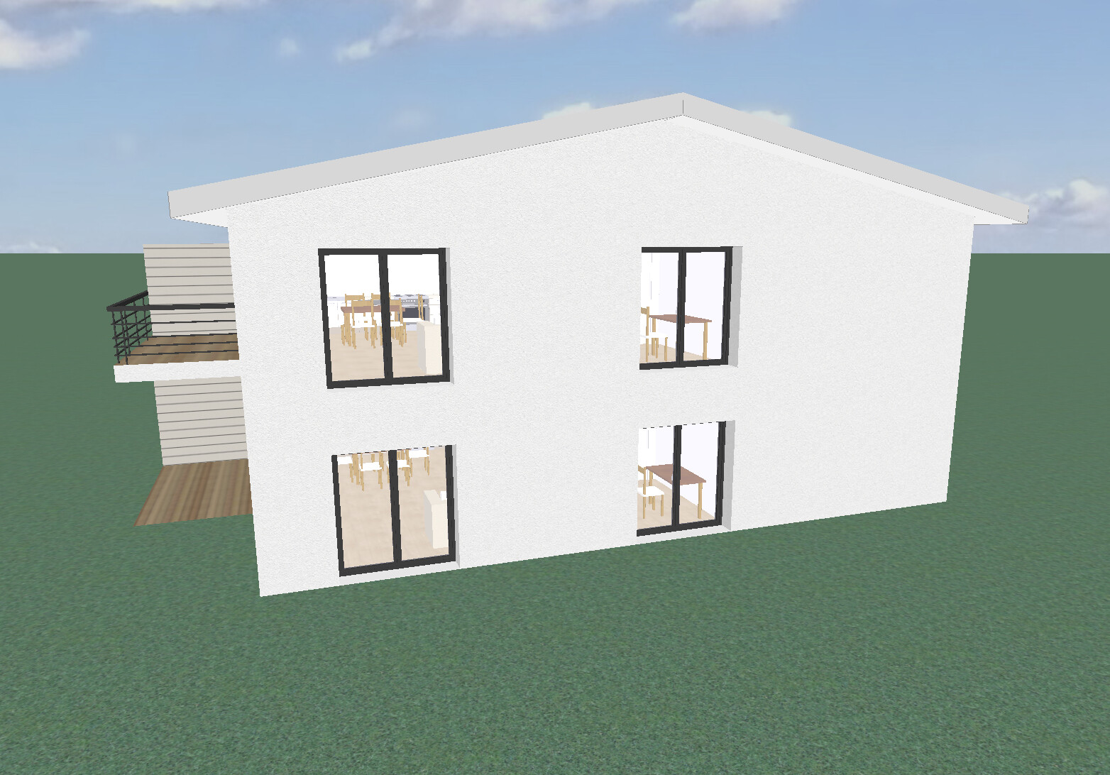 Modern two-story white house with large windows, left wooden deck and green garden.