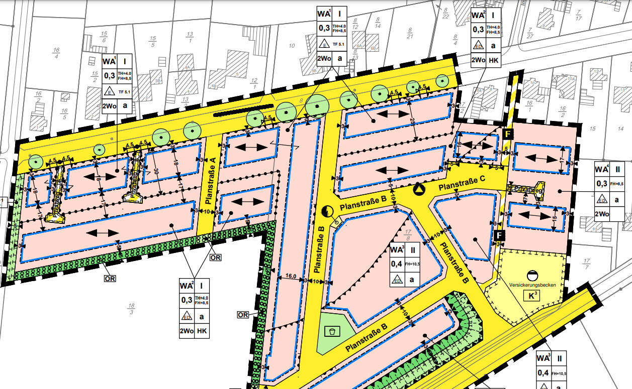 Detailed site plan of a residential area with planned streets, plots, and green spaces.