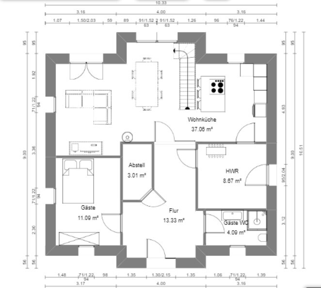 Floor plan of a house with living kitchen, hallway, and storage rooms