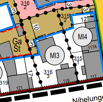 Site plan showing plot boundaries, building areas, and roads
