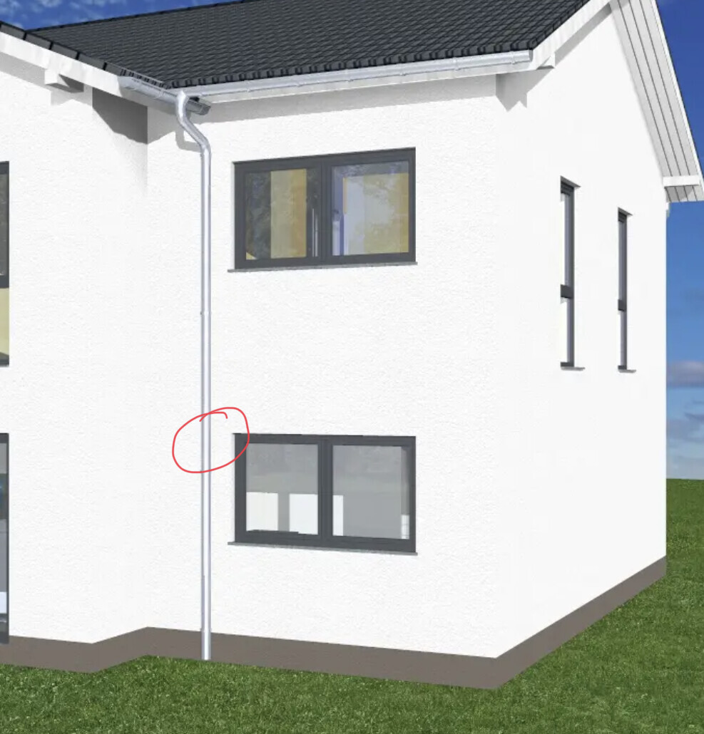 White house facade with dark window frames, gutter and vertical downpipe; highlighted area.