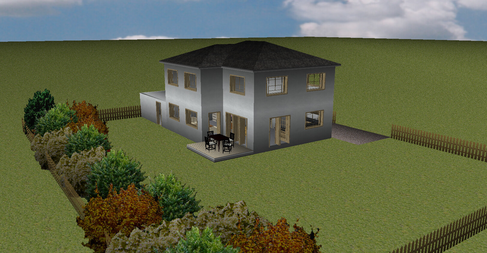 Two-story grey house with dark roof, terrace with table and chairs, garden with fence.