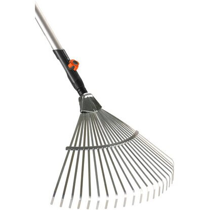 Garden rake with long metal tines and handle