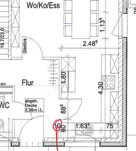 2D floor plan of an open living, kitchen, and dining area with hallway