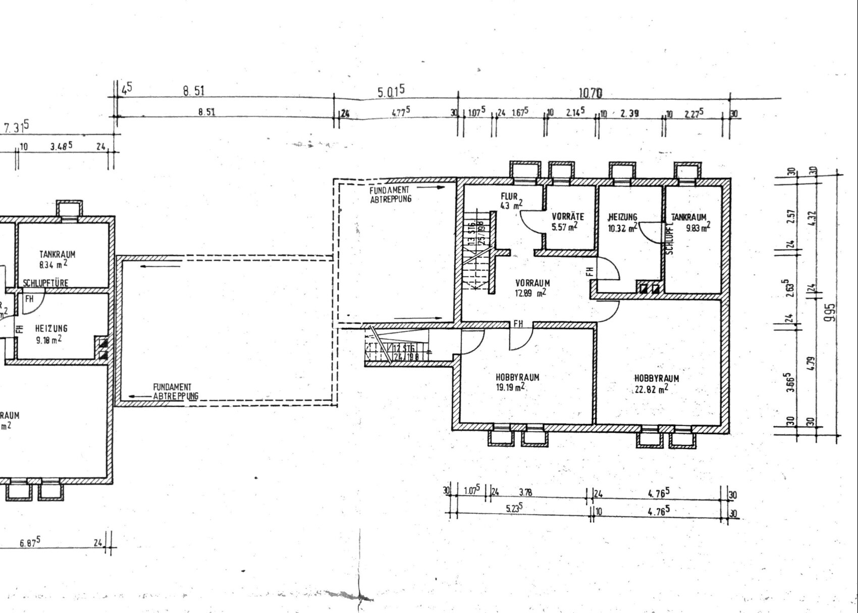 Floor plan of a building part with hobby rooms, storage, heating, tank room, hallway, and stairs