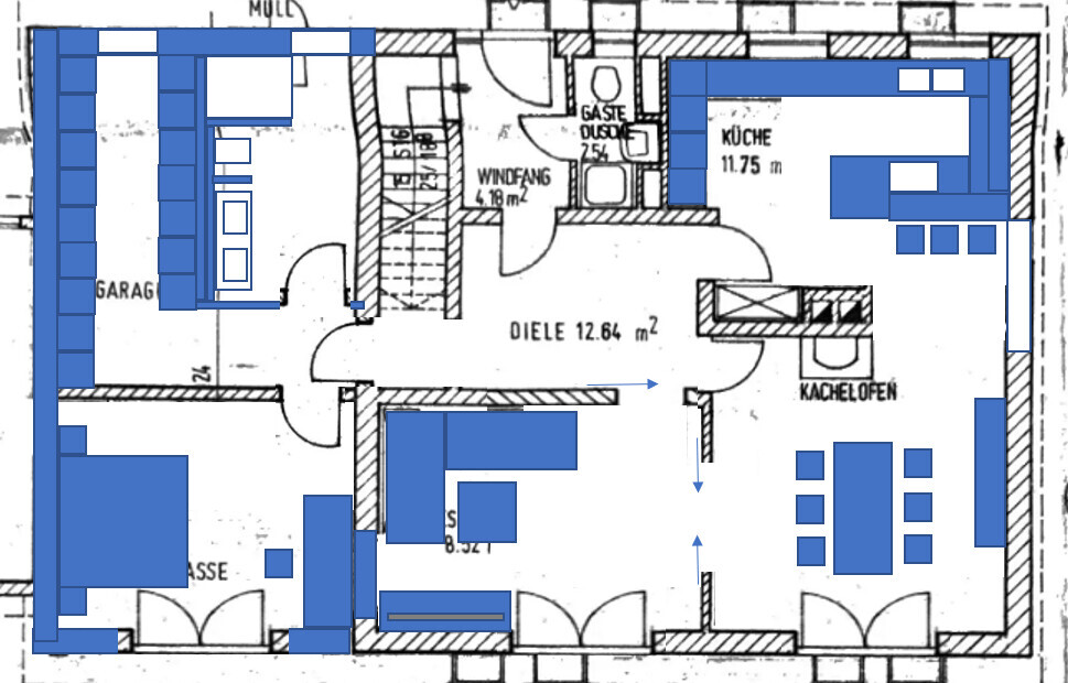 Floor plan of a house with kitchen, hallway, garage, and living area; blue highlighted areas