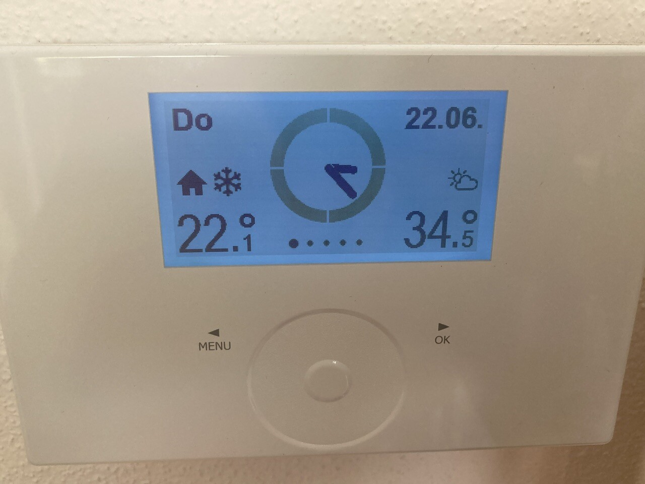 Digital heating thermostat with display, temperature reading, and controls
