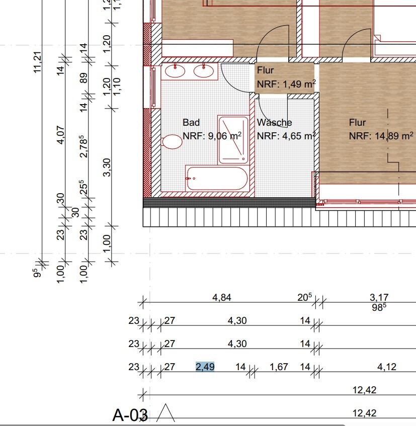 Floor plan of an apartment: bathroom with bathtub and sink, separate laundry room, hallway.