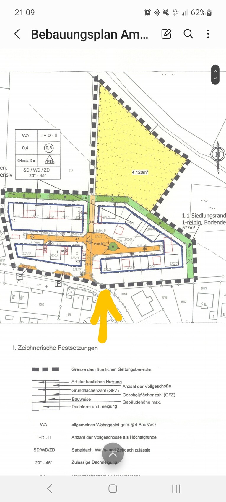 Site plan of a building area with plots, roads, and yellow highlighted section