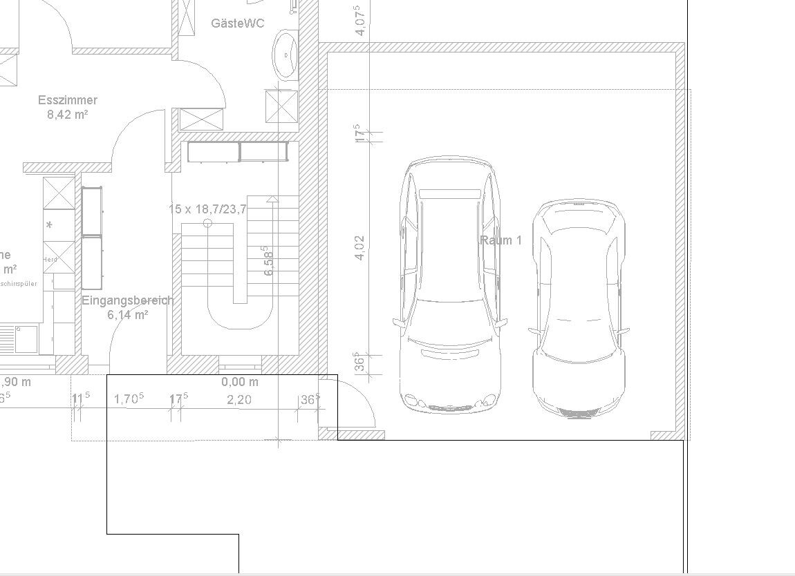 Floor plan: garage with two cars, adjacent stairwell and entrance area.
