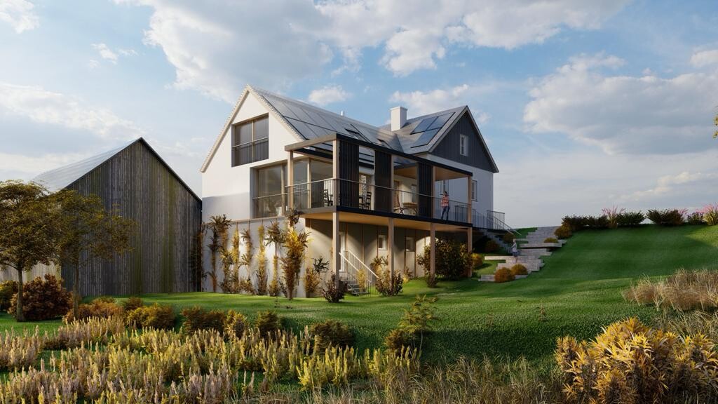 Modern two-story villa with balcony, hillside location, garden, and person on the balcony.