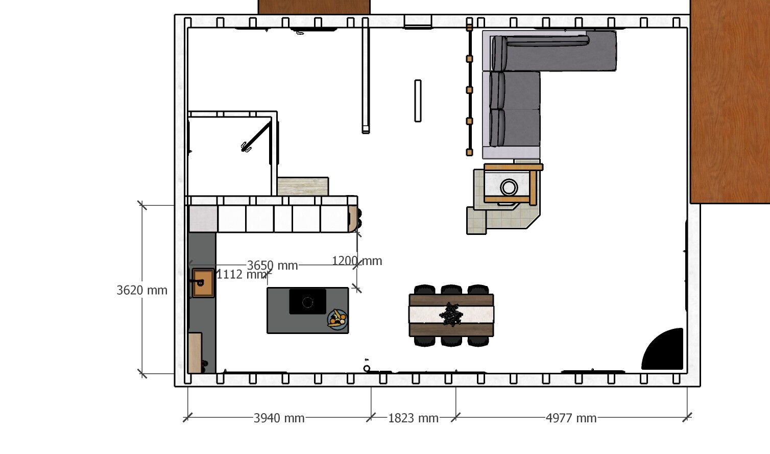 Open floor plan: living and kitchen area with kitchen island, dining table, and sofa.