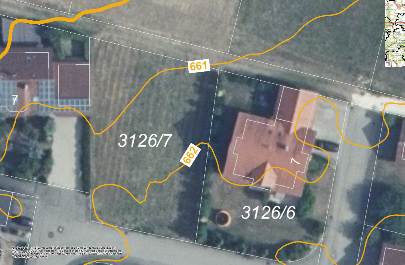 Fragment of a plot plan from above with plots 3126/6 and 3126/7, orange boundary line.