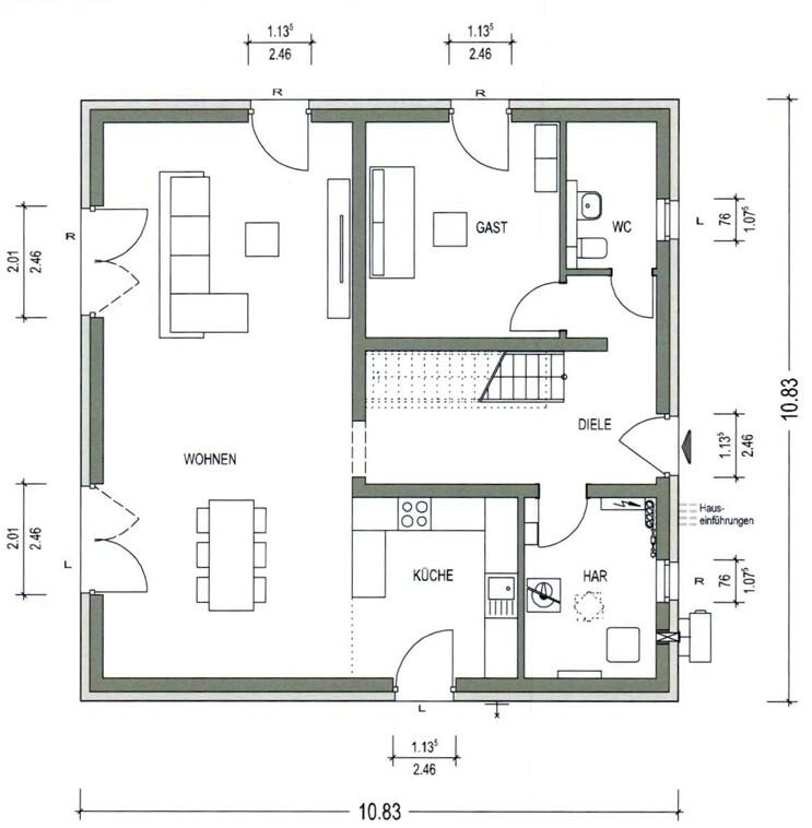 Floor plan: left living area, kitchen below, guest room, hallway with stairs, WC, utility room.