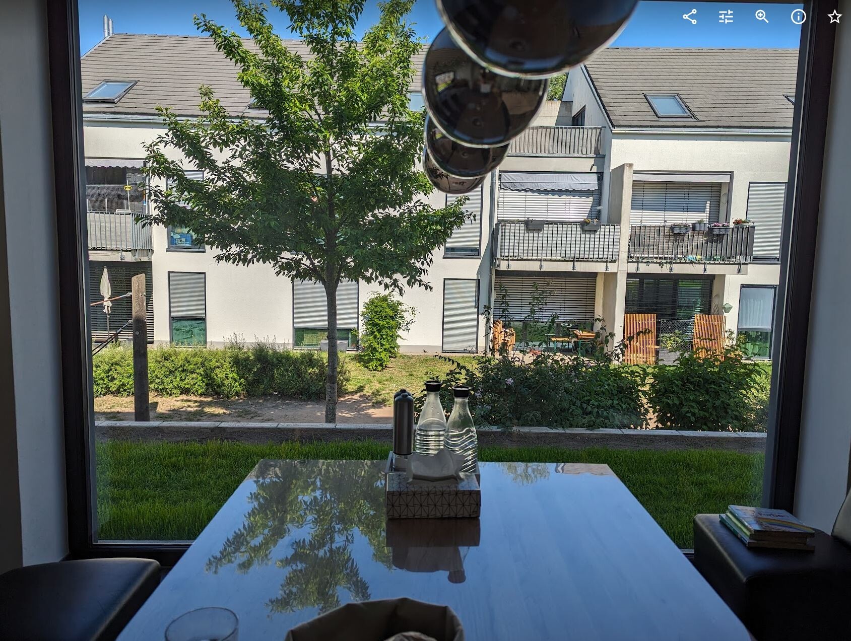 Dining area with large window and garden view