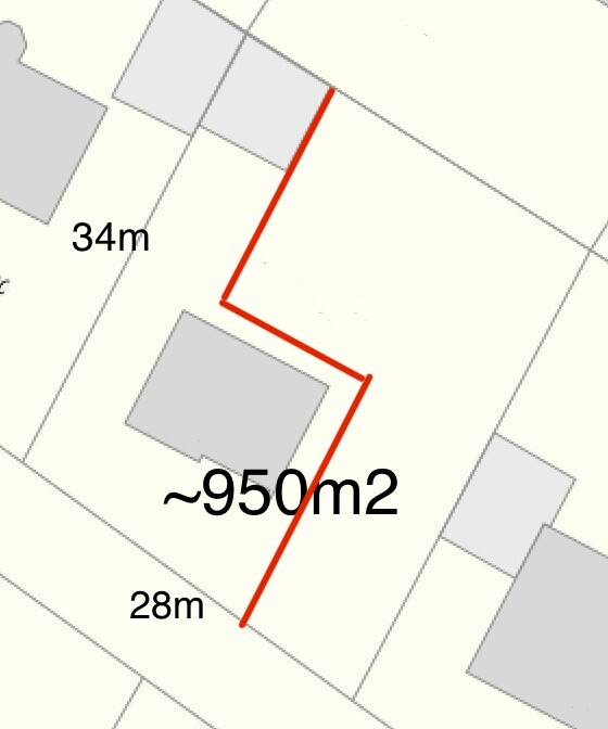 Site plan of a building plot with red boundary lines and approximate dimensions 34m x 28m.