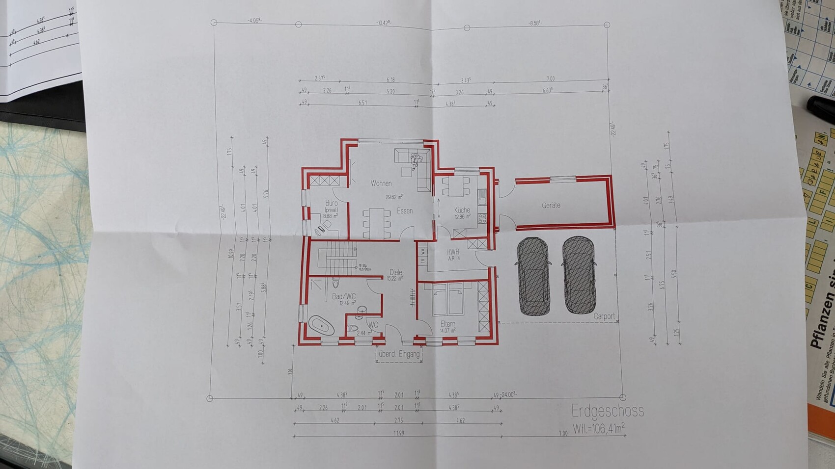 Ground floor plan of a house with red outline and interior layout.