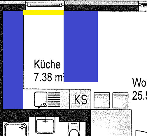 Kitchen floor plan with sink and cooking area.