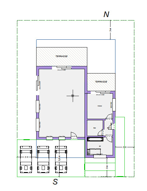 Floor plan of a building with terraces, entrances, garage, and outdoor areas; north at the top