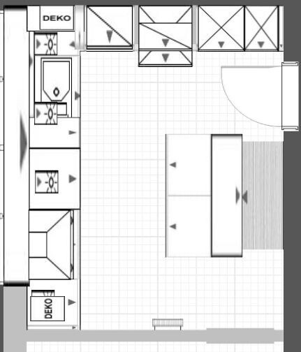 Kitchen floor plan: base cabinets on the left, upper wall cabinets, island in the middle, door on the right.