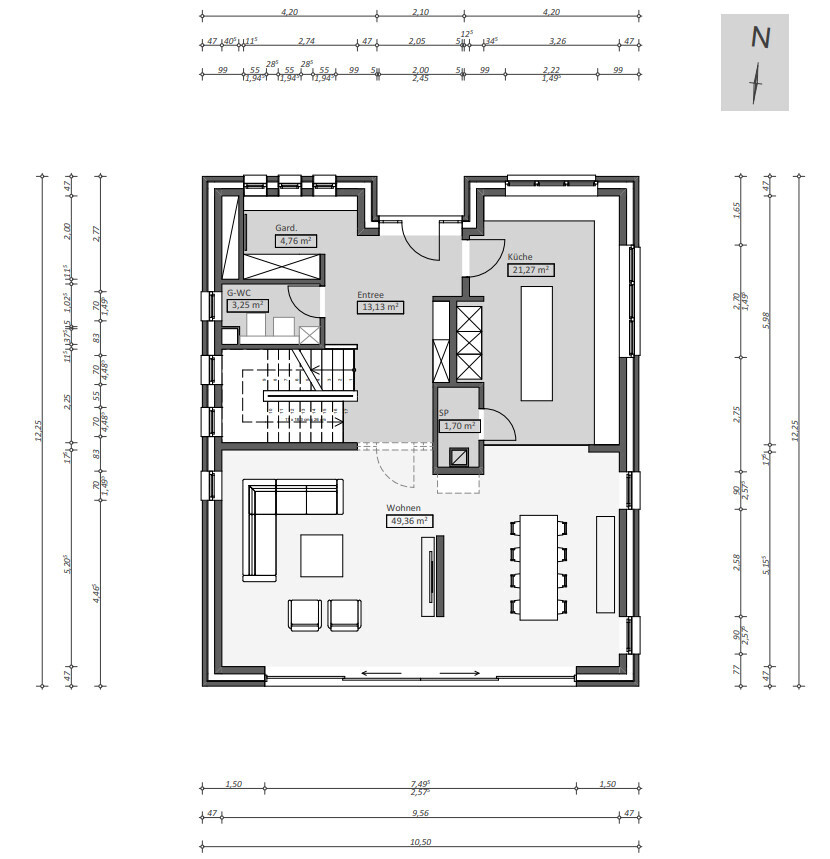 Floor plan of an open living and dining area with kitchen and entrance