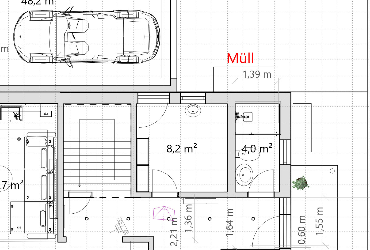 Floor plan of a house with garage, hallway, and various rooms