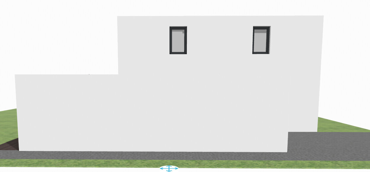 White modern building facade with two narrow windows, street view and green area.