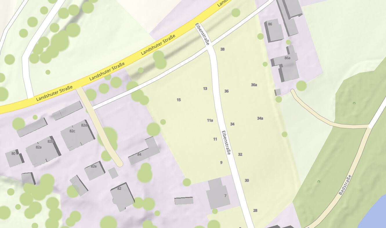 Kartenansicht eines Ortsteils mit Landshuter Straße, Gebäuden und Grünflächen.