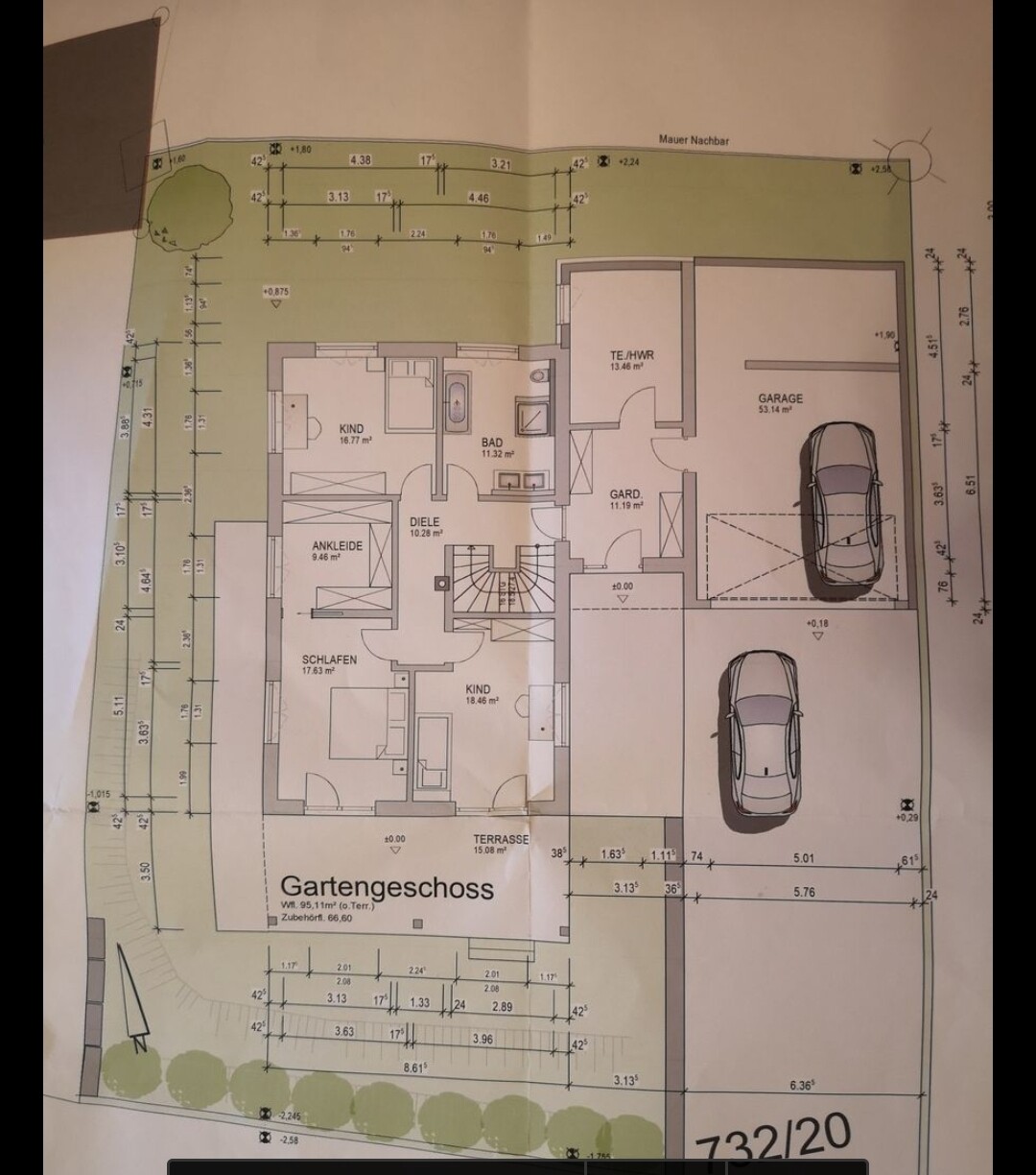 Floor plan of a single-family house with garage, terrace, and garden.