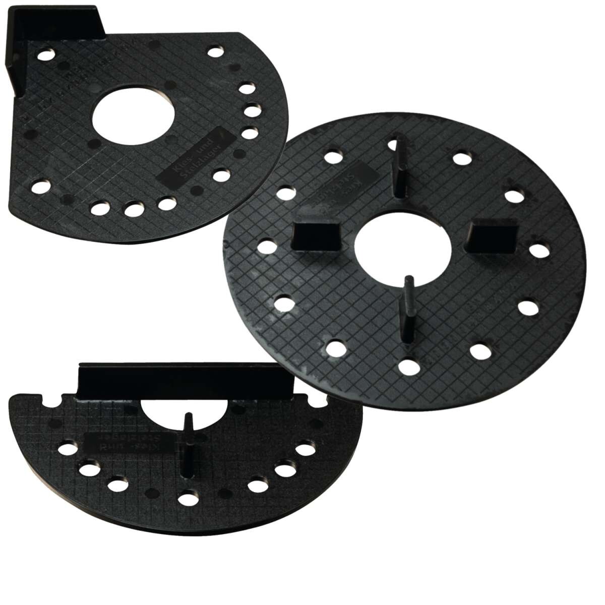 Black plastic mounting disc set with holes and retention tabs