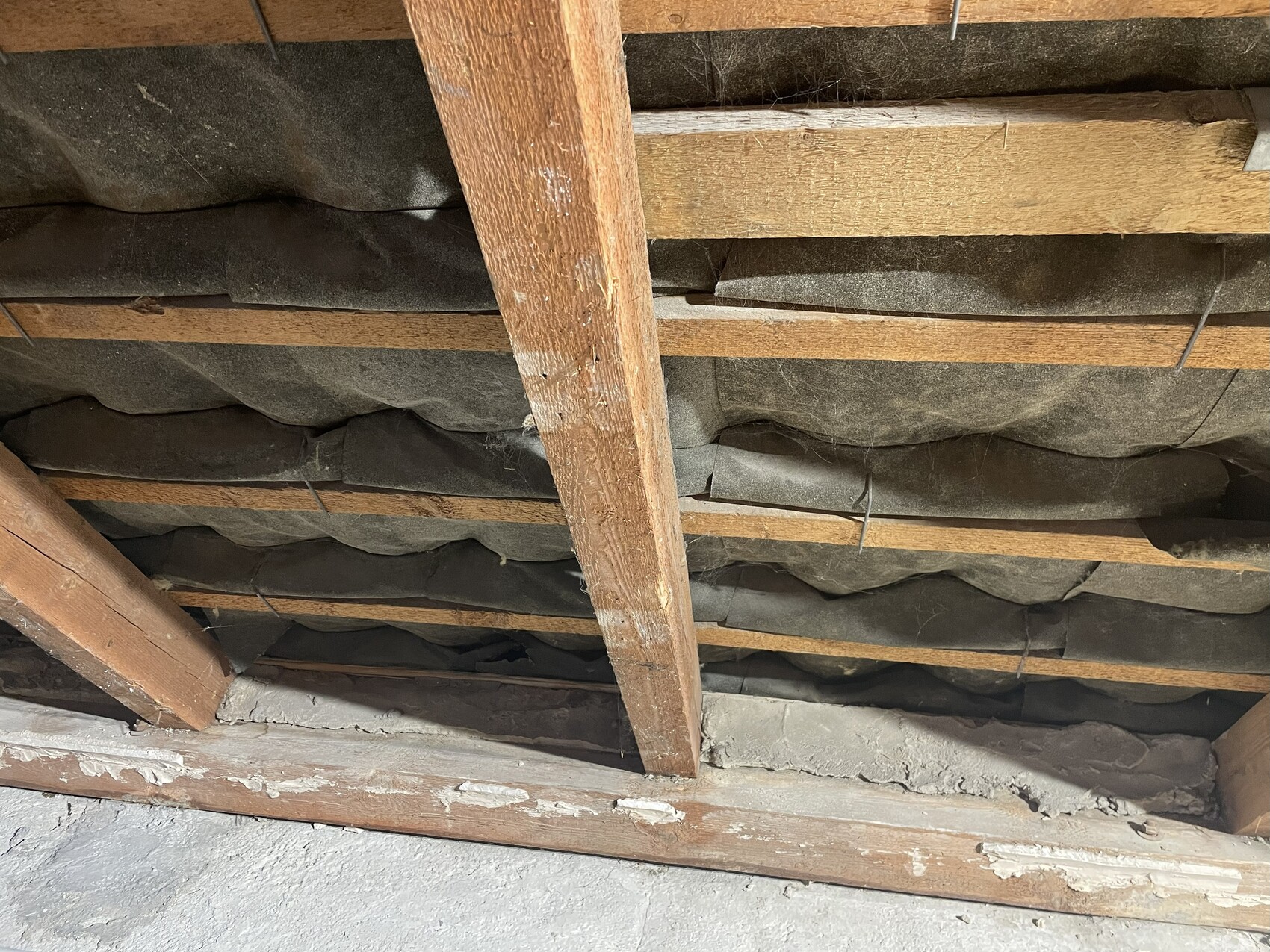 Attic with insulation: Insulation boards placed between wooden beams