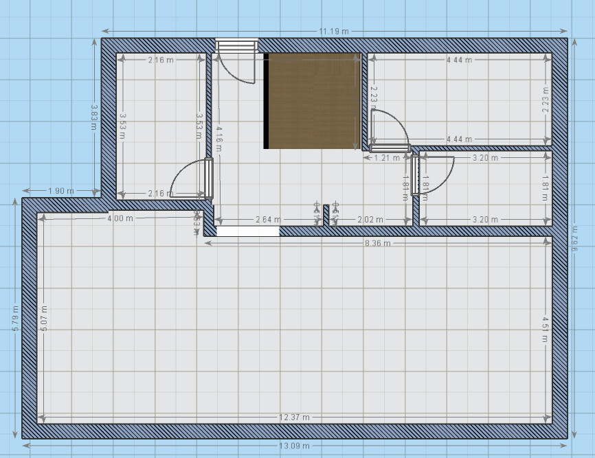 Floor plan of a house with multiple rooms, entrance, hallway, kitchen, and living room