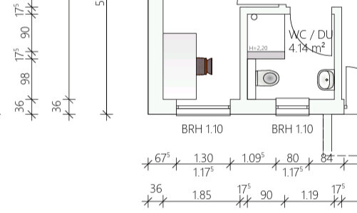Bathroom floor plan with toilet/shower and measurements.
