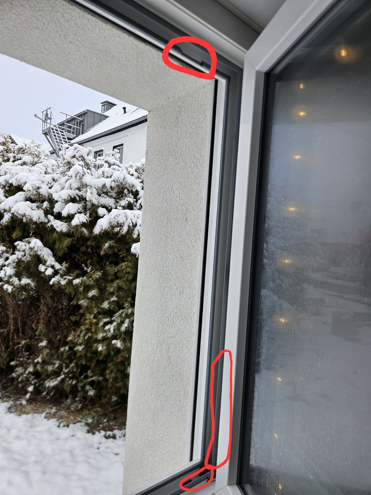 Open window with white frame, winter snow landscape outside