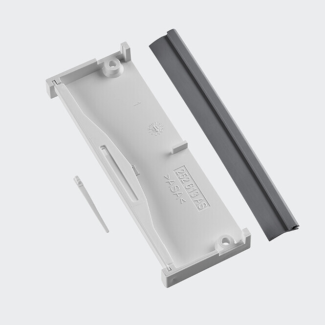 White plastic casing with dark rail as a window shutter holder