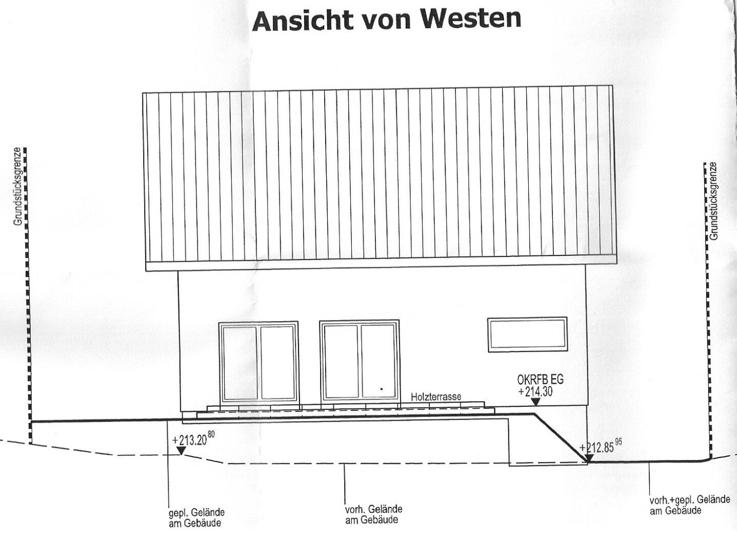 West elevation of a house with a long roof, wooden terrace, and glass doors.